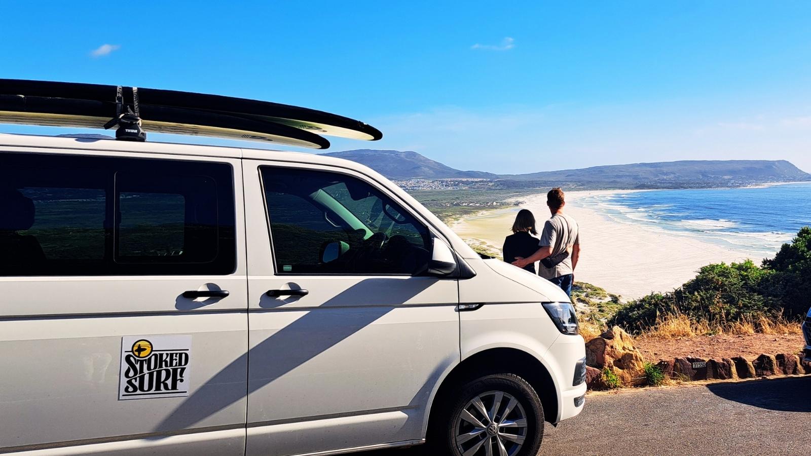 Stoked Surf vehicle overlooking the Cape Town coastline while checking local surf conditions.